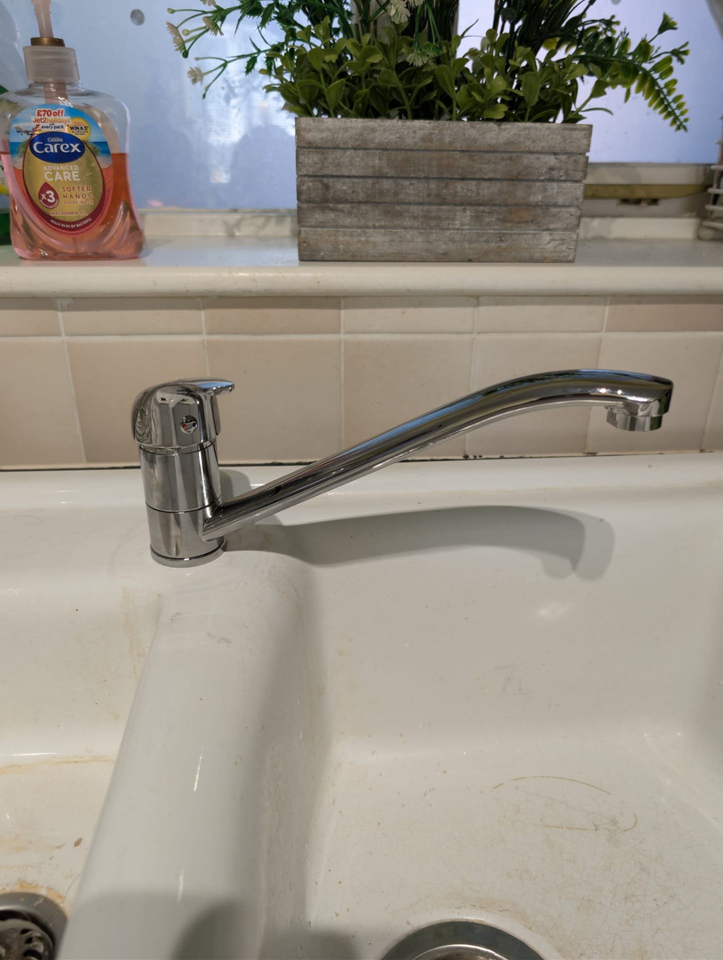 New polished chrome kitchen mixer tap fitted